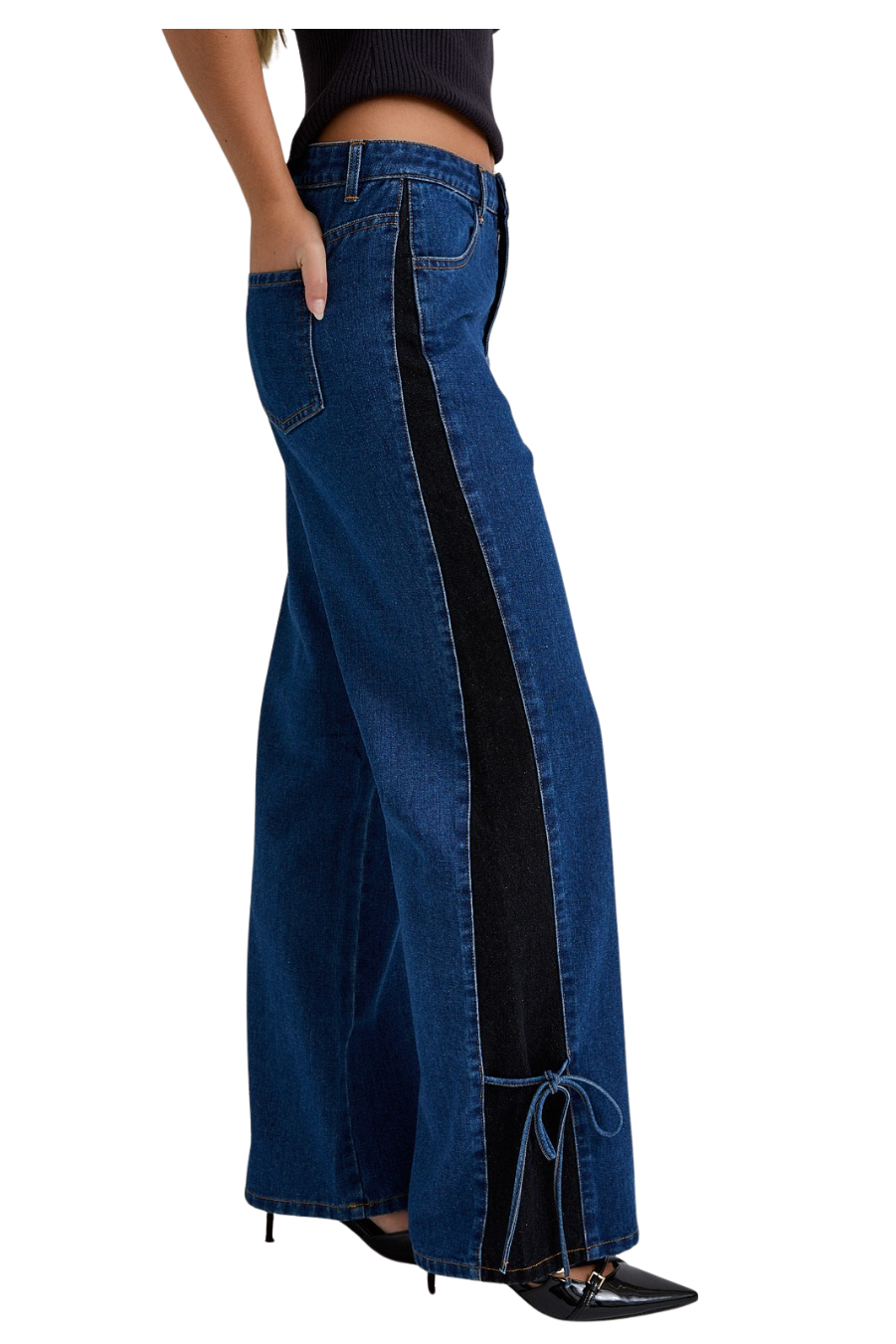 Blue jeans with a black side panel on a white background